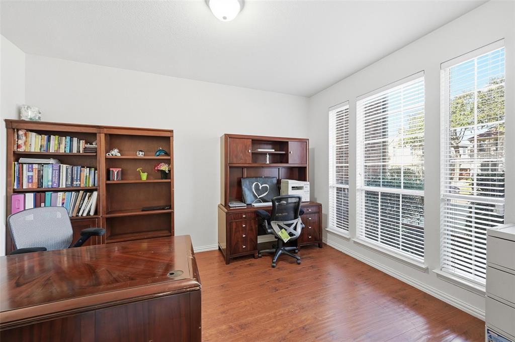 2319 Goshawk Street Grand Prairie, TX 75052 - Photo 6 of 40 a view of a workspace with furniture and a window