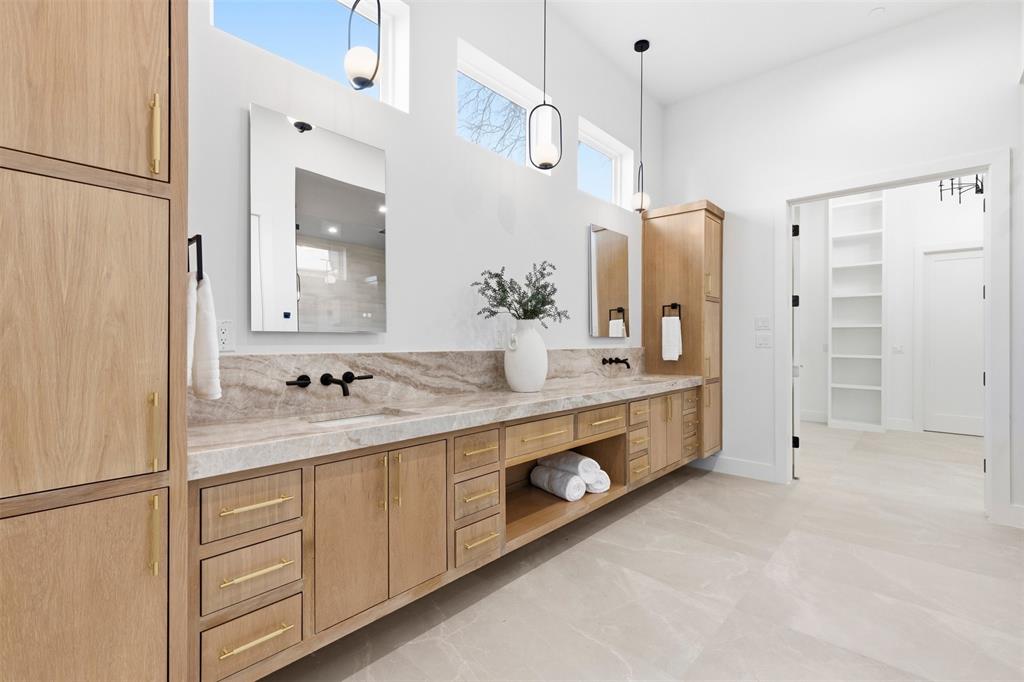 6257 Turner Way Dallas, TX 75230 - Photo 18 of 39 a bathroom with a double vanity sink mirror and double