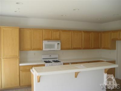 1621 Sonata Drive Oxnard, CA 93030 - Photo 4 of 4 a room with storage and utility