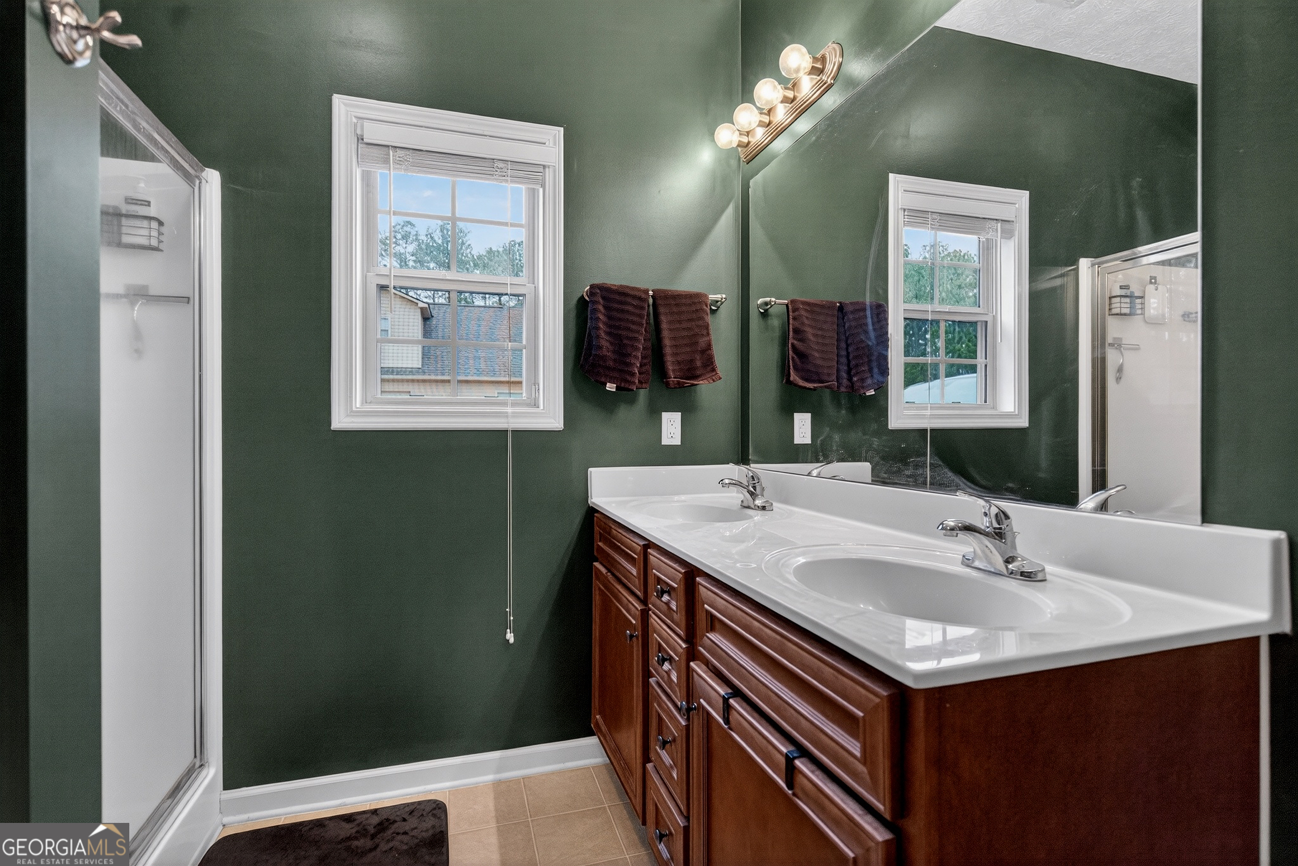 107 Amhurst Drive West Point, GA 31833 - Photo 17 of 29 a bathroom with a sink vanity and a mirror