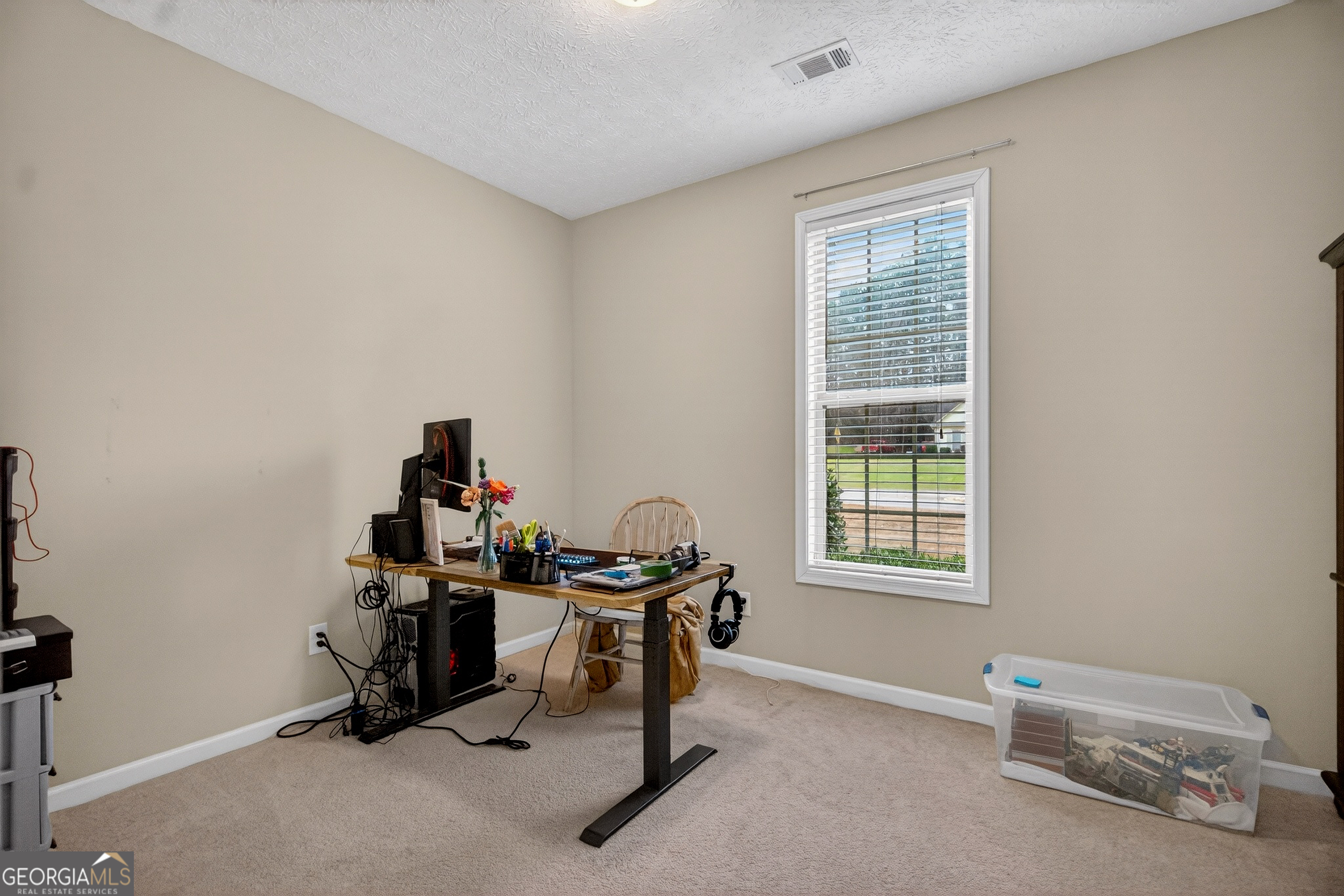 107 Amhurst Drive West Point, GA 31833 - Photo 20 of 29 a view of a workspace with furniture and a window