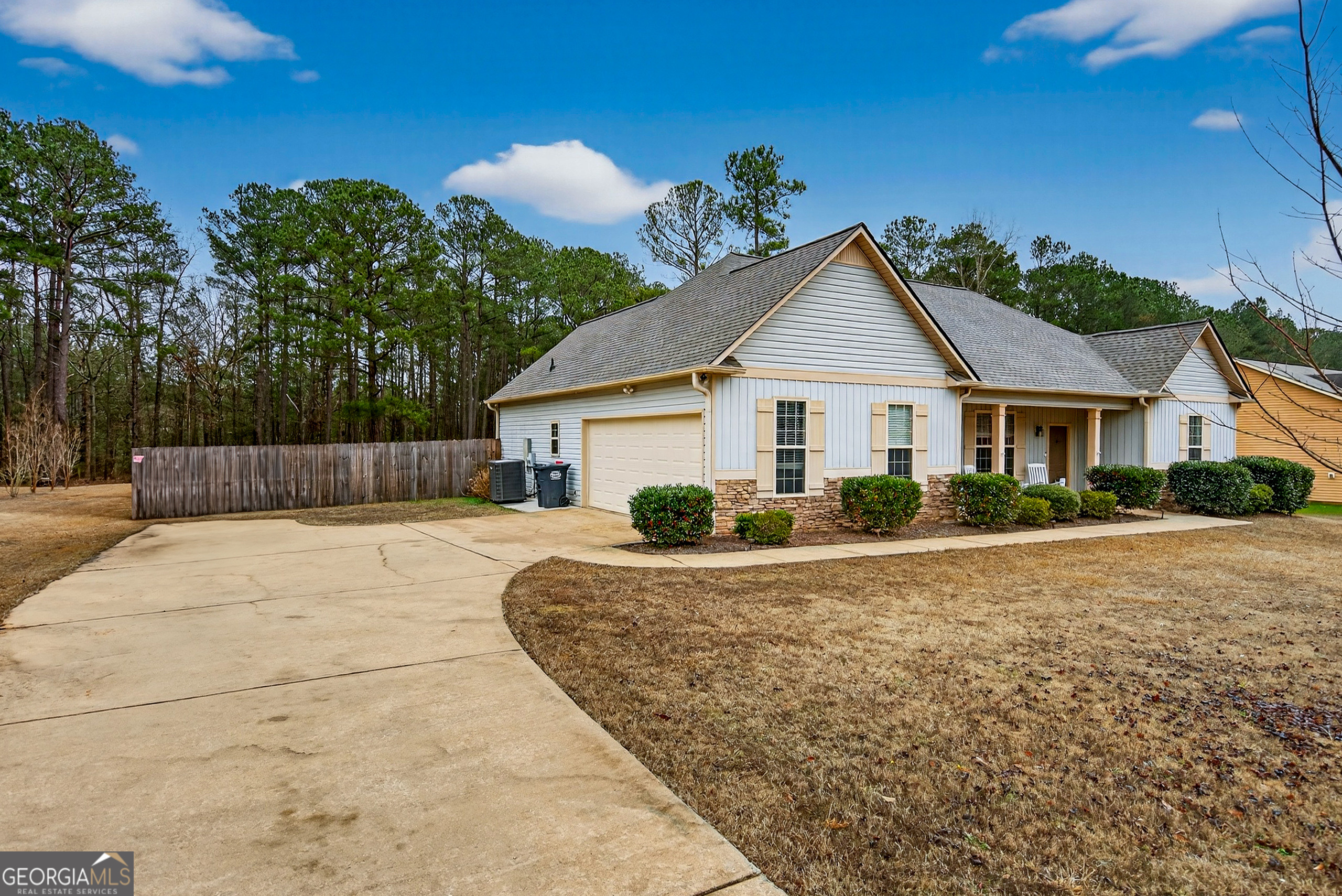 107 Amhurst Drive West Point, GA 31833 - Photo 2 of 29 a front view of a house with a yard