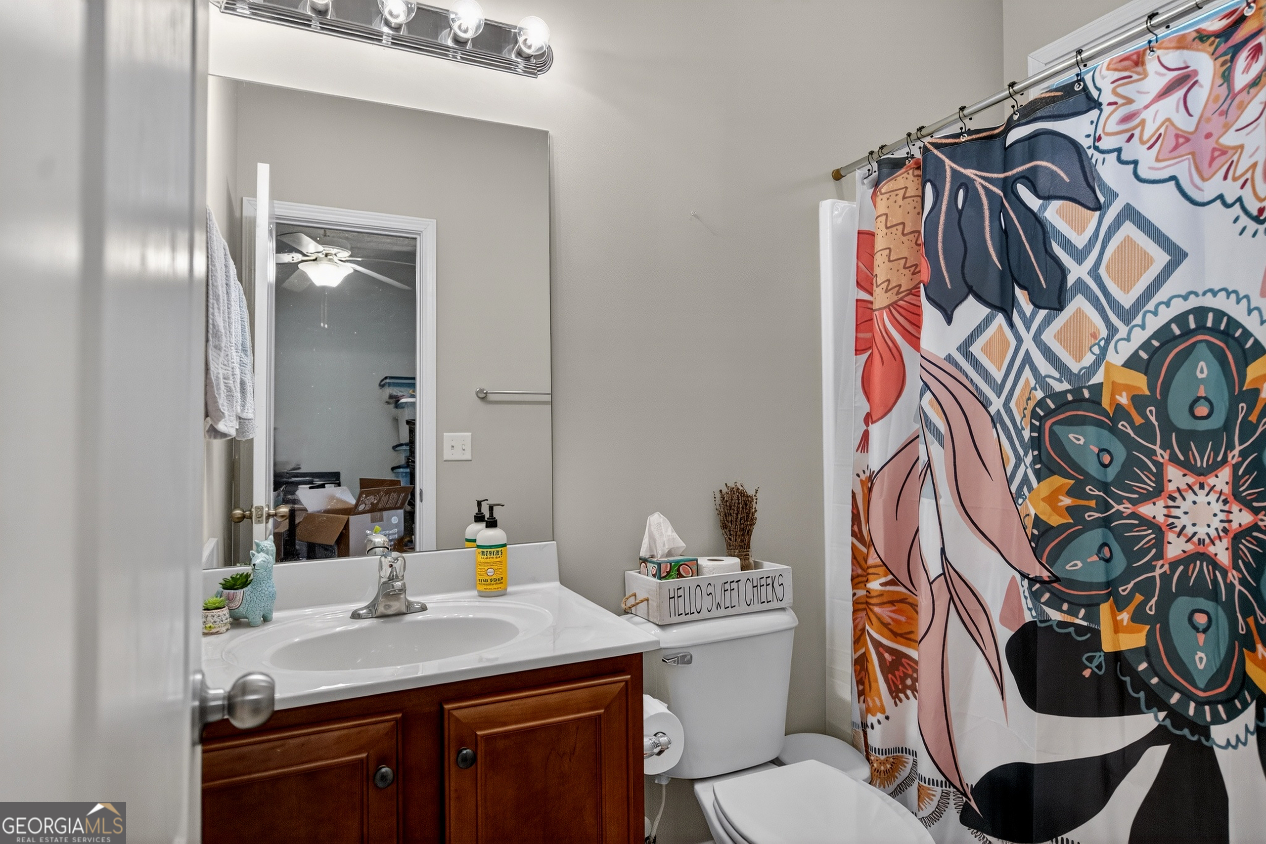 107 Amhurst Drive West Point, GA 31833 - Photo 24 of 29 a bathroom with a sink toilet and mirror