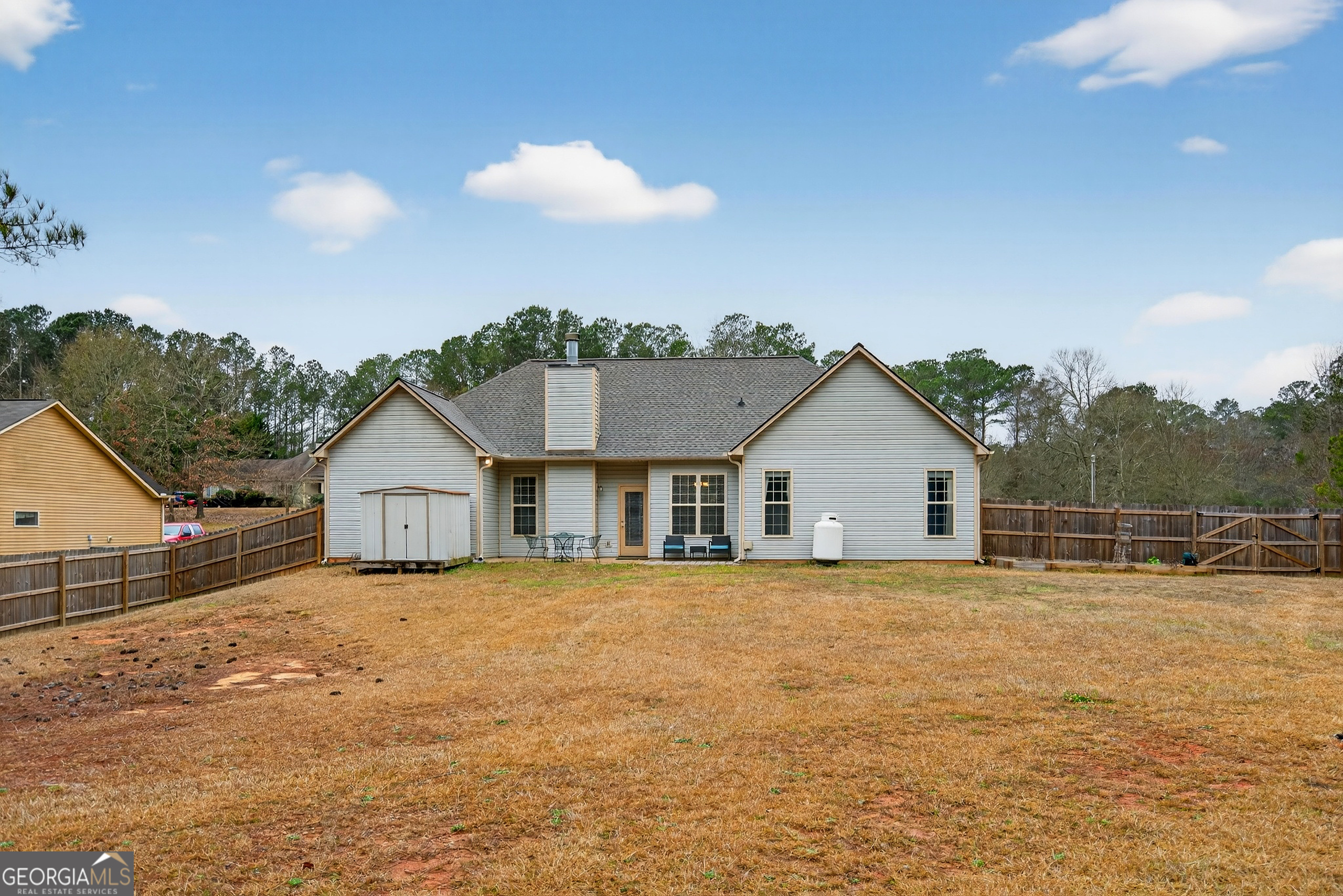 107 Amhurst Drive West Point, GA 31833 - Photo 25 of 29 a view of a house with a yard and potted plants