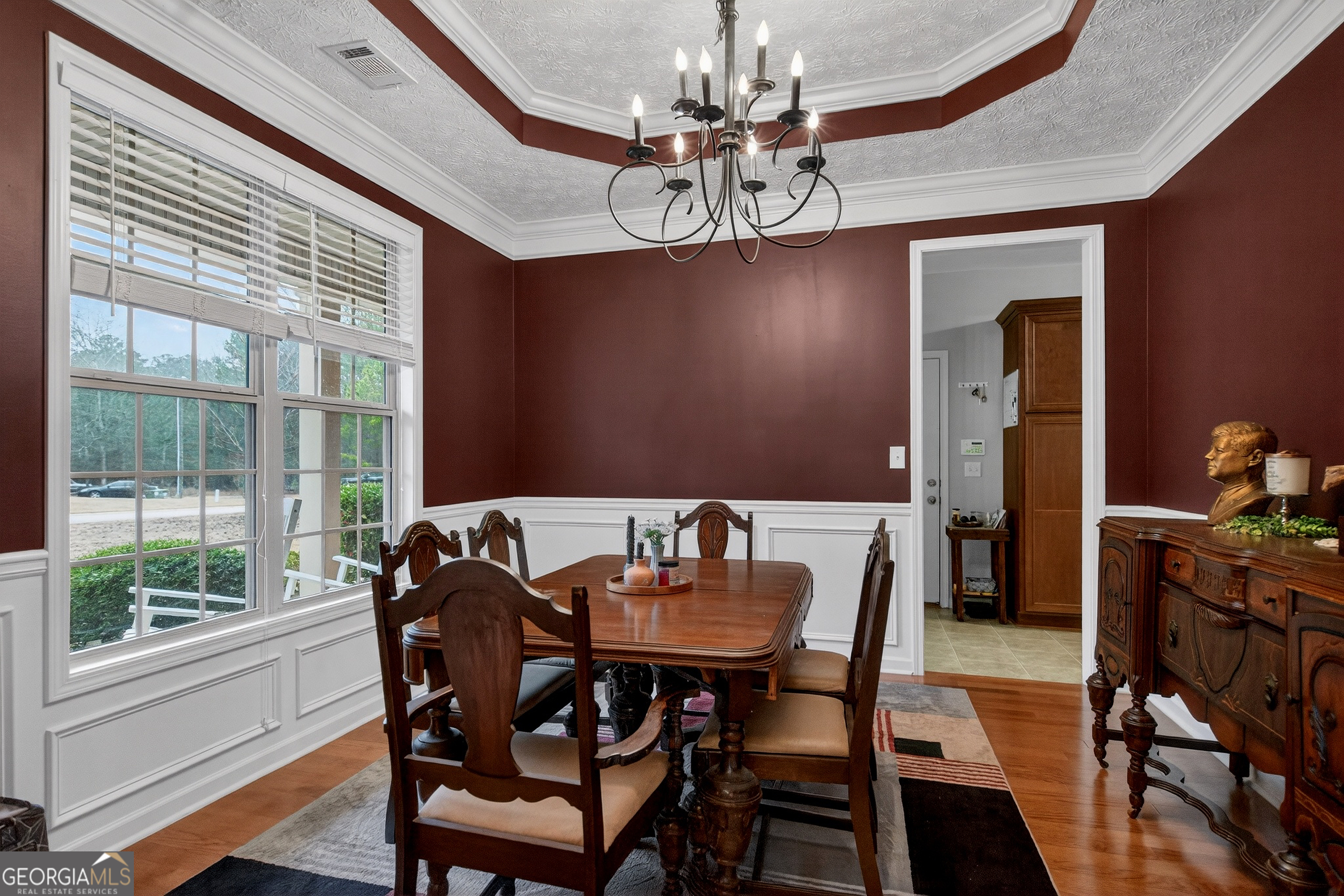 107 Amhurst Drive West Point, GA 31833 - Photo 4 of 29 a view of a dining room with furniture window and wooden floor