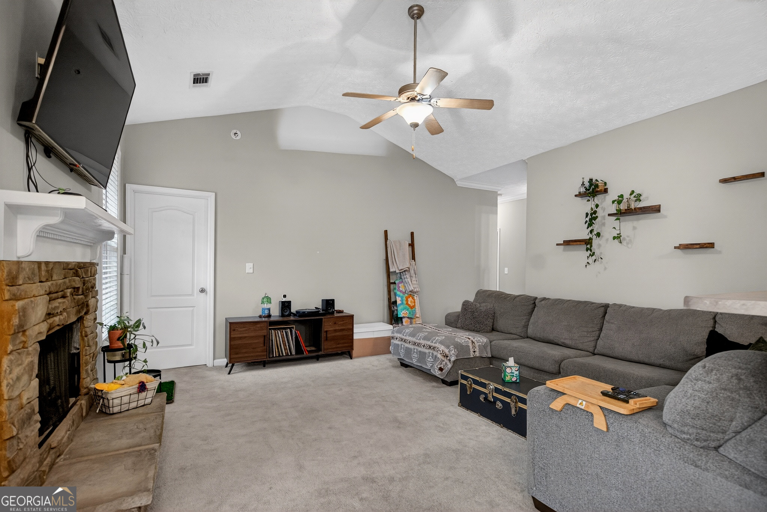 107 Amhurst Drive West Point, GA 31833 - Photo 8 of 29 a living room with furniture and a fireplace
