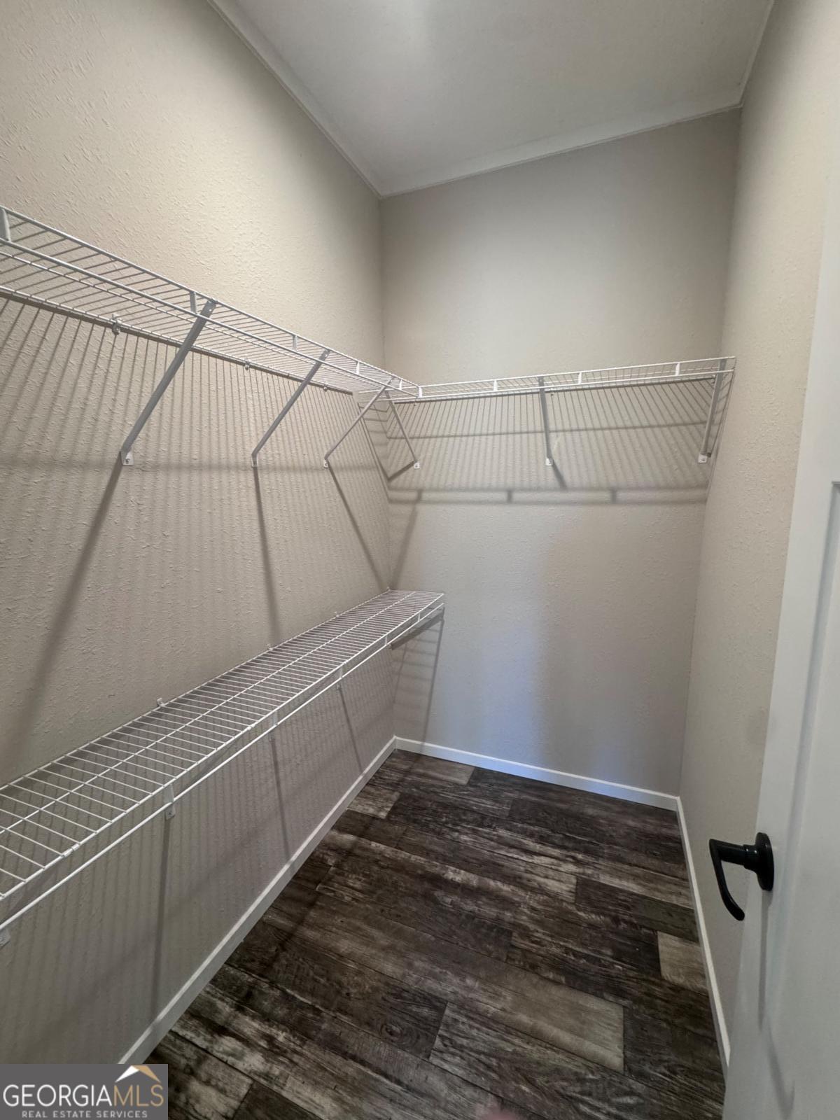 44 Long Leaf Road Hazlehurst, GA 31539 - Photo 15 of 21 a view of a room with racks on the wall