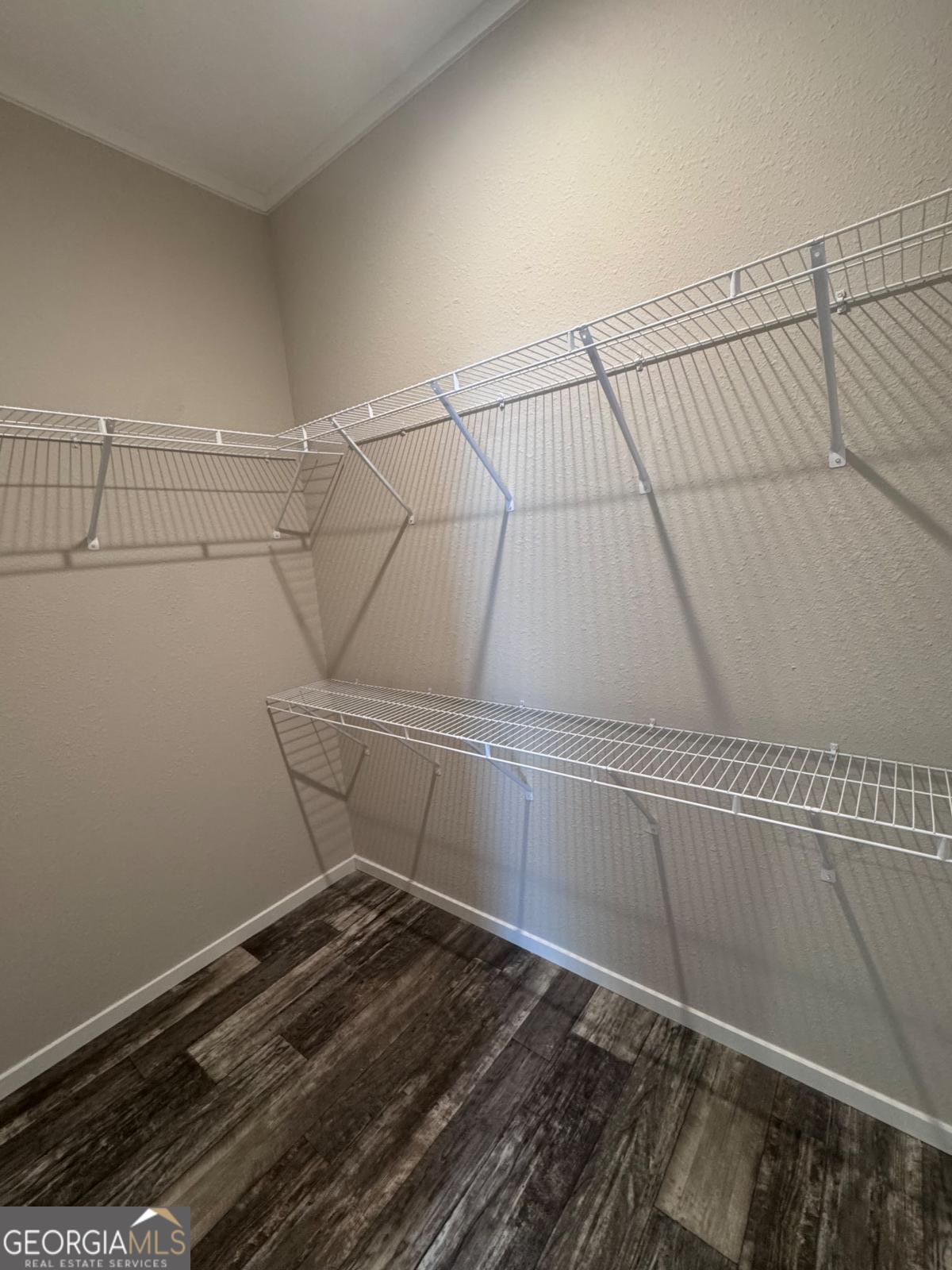 44 Long Leaf Road Hazlehurst, GA 31539 - Photo 9 of 21 a view of a room with racks on the wall