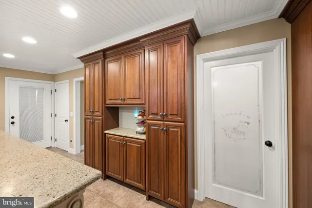 a view of a kitchen from the hallway