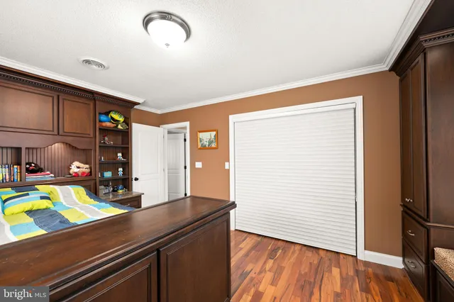 a view of a room with a large window