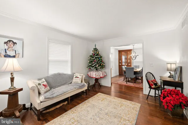a kitchen with granite countertop a sink and a refrigerator
