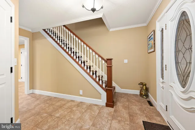 a view of house with yard entertaining space and seating area