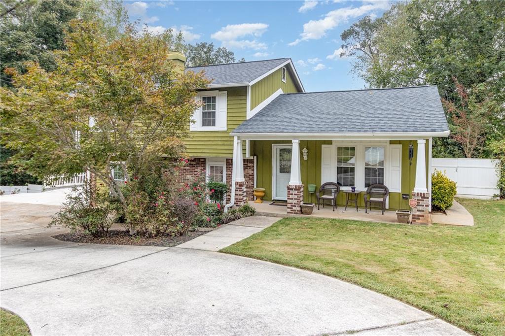 3778 Berdon Lane Decatur, GA 30034 - Photo 1 of 1 a front view of house with yard and outdoor seating