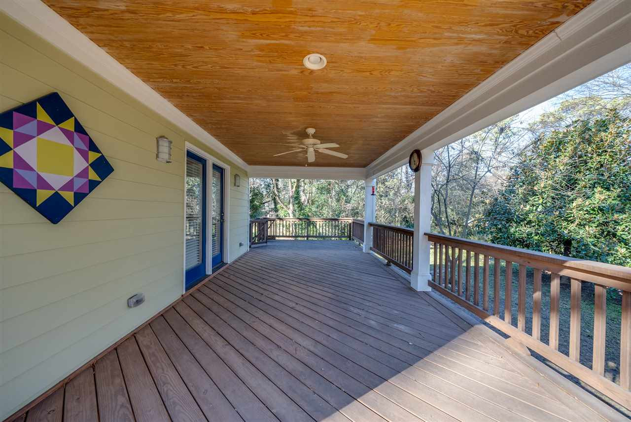 703 Kimbrough Street Raleigh, NC 27608 - Photo 20 of 25 Spacious covered porch off the Master bedroom. Covered Porch