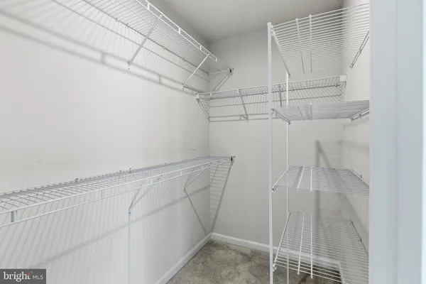a view of a room with racks on the wall