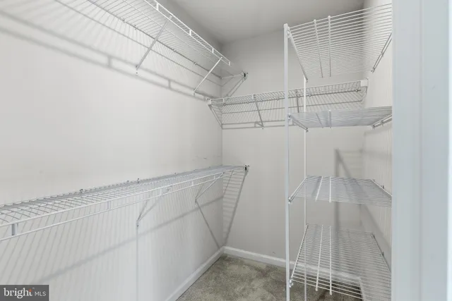 a view of a room with racks on the wall