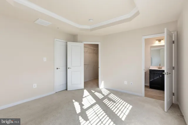 a view of a bedroom with closet area