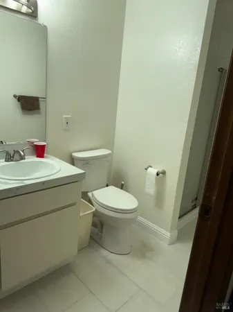 a bathroom with a toilet and a sink
