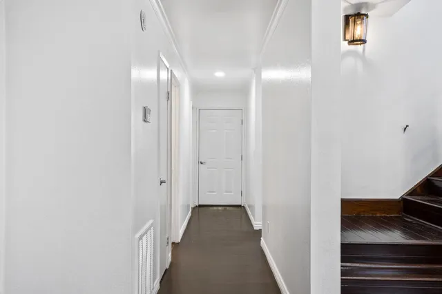 a view of hallway with stairs