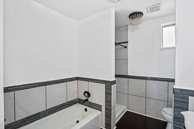 a bathroom with a sink and a shower