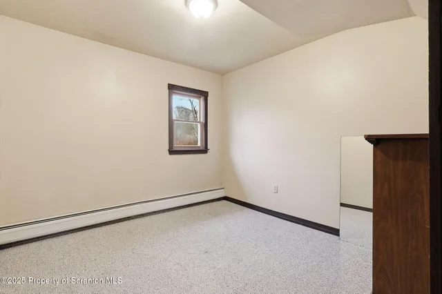 an empty room with closet