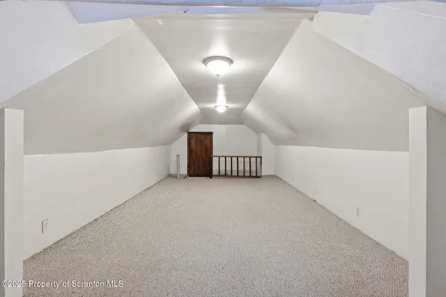 a view of yard with swimming pool and trees