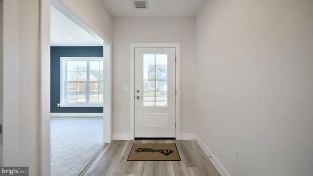 a view of a room that has a window in it