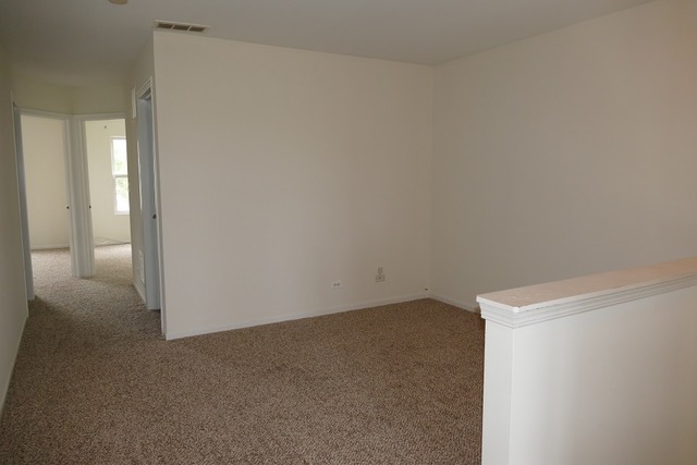 287 Springbrook Trail South Oswego, IL 60543 - Photo 11 of 14 a view of an empty room