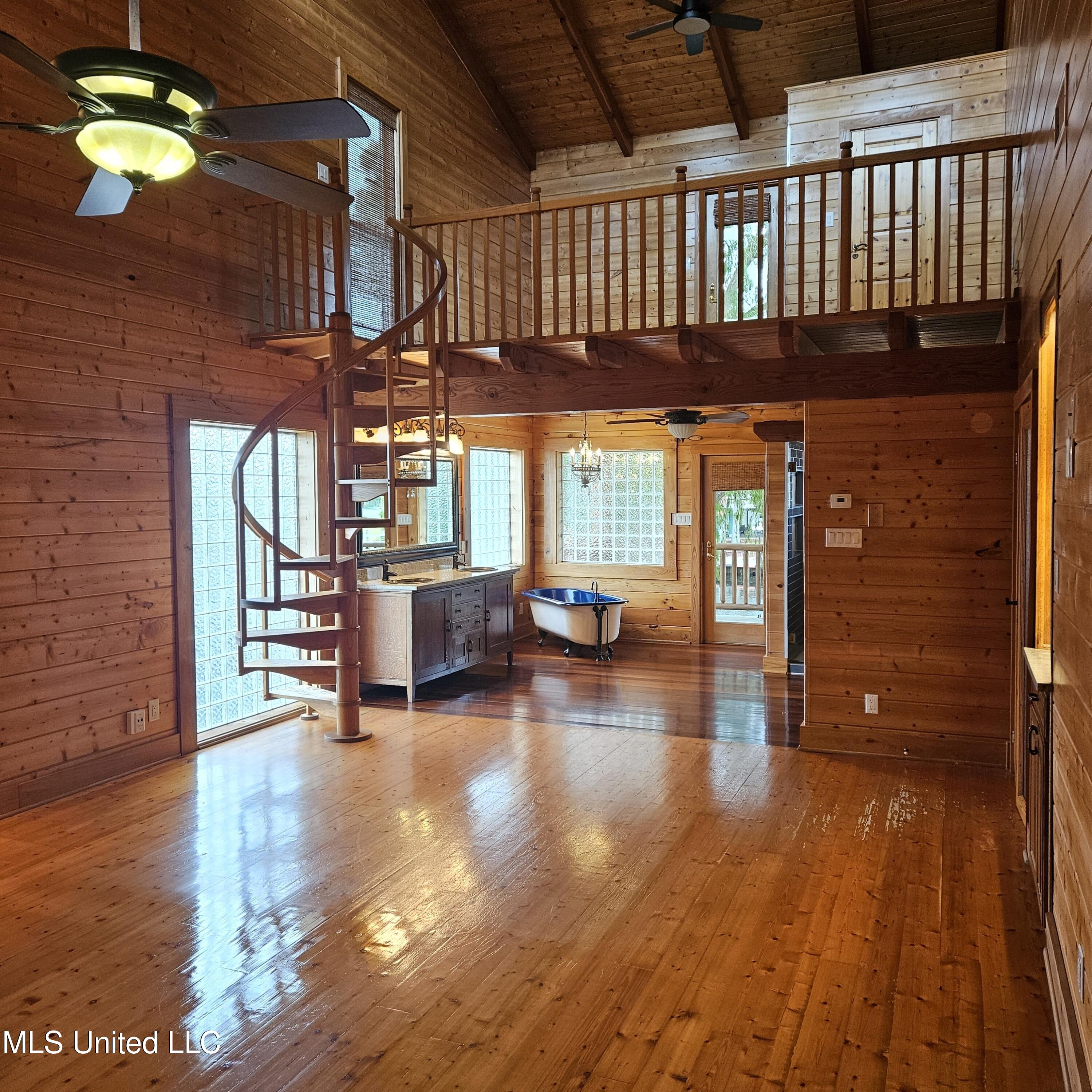 15127 Chickasaw Road Kiln, MS 39556 - Photo 15 of 44 15127 Chickasaw - Master Bedroom & Loft