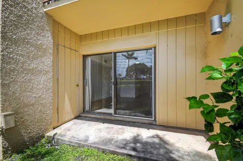 a view of a pathway both side of house