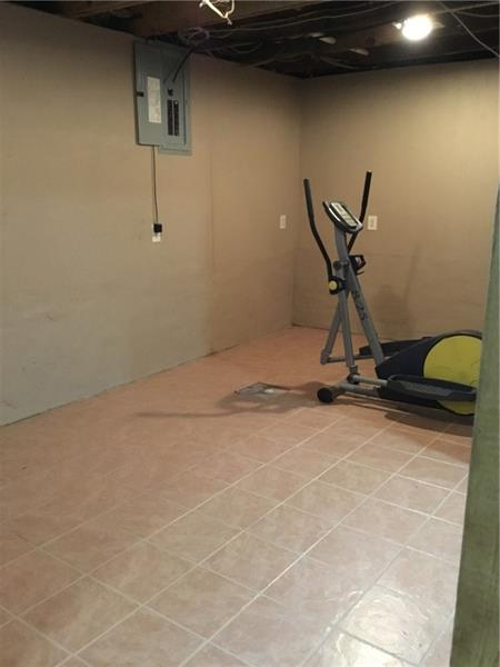 335 Craigsville Road Worthington, PA 16262 - Photo 16 of 25 Smaller finished room in the basement for your home gym, playroom, or storage.