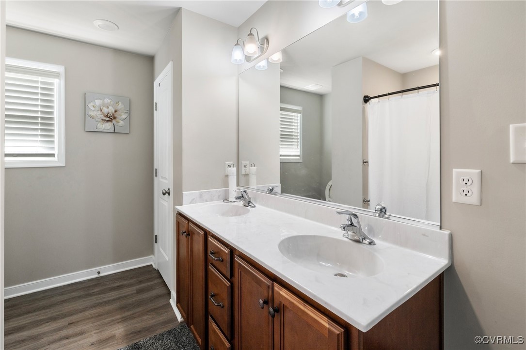 7313 Appelman Road Chesterfield, VA 23832 - Photo 15 of 21 Bathroom featuring hardwood / wood-style floors an