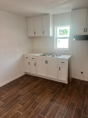 a view of livingroom with wooden floor and closet