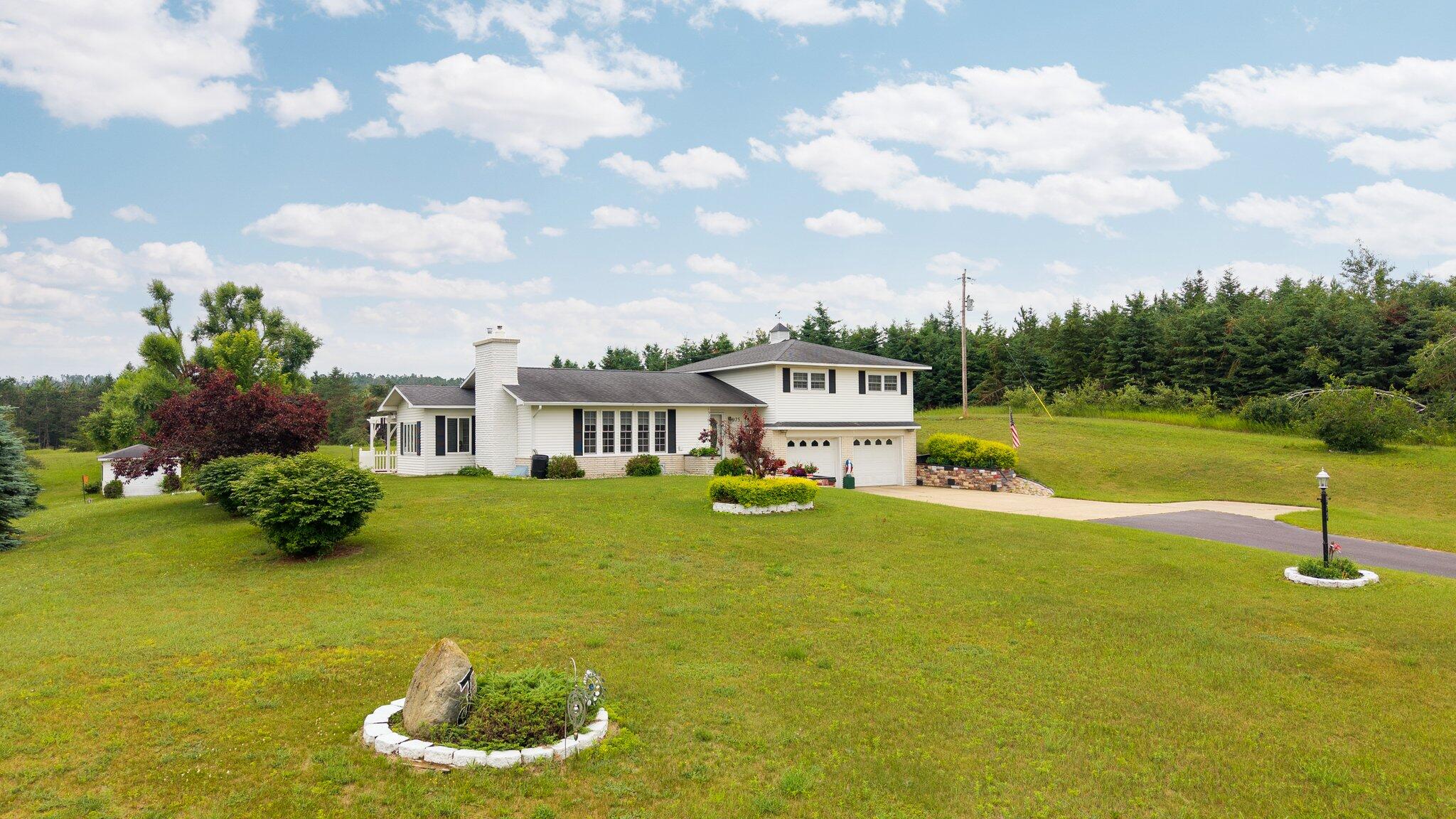 975 Poquette Road Gaylord, MI 49735 - Photo 4 of 57 1-web-or-mls-DJI_20250707120309_0005_D