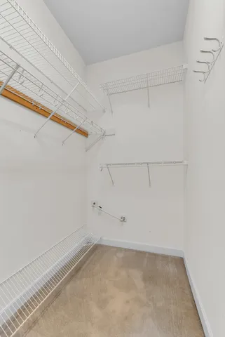 a view of a room with racks on the wall