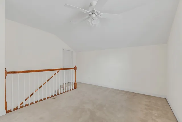 a view of a hallway with staircase