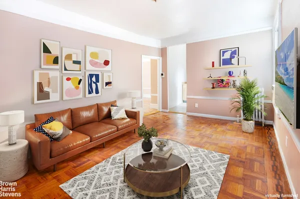 a living room with furniture and a rug