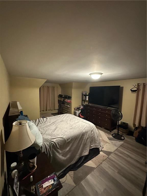 8585 Peebles Road Pittsburgh, PA 15237 - Photo 12 of 23 a bedroom with a bed and a view of bathroom