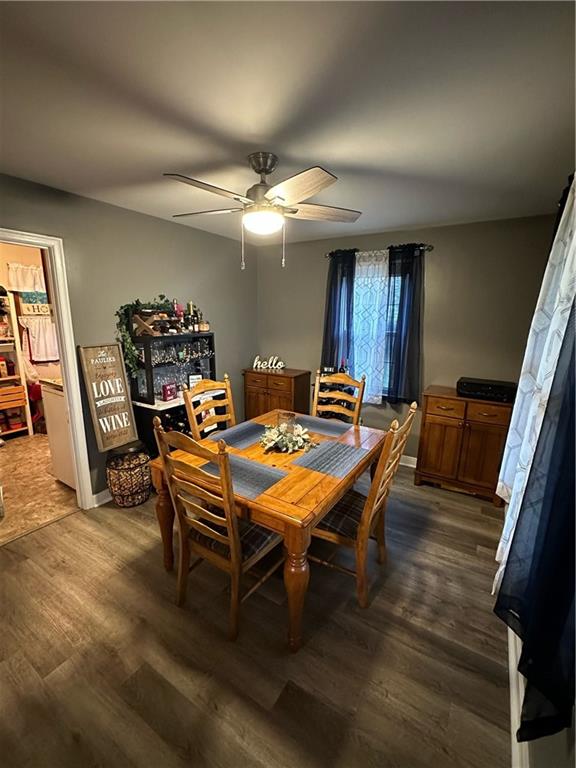 8585 Peebles Road Pittsburgh, PA 15237 - Photo 6 of 23 a view of a dining room with furniture and a chandelier