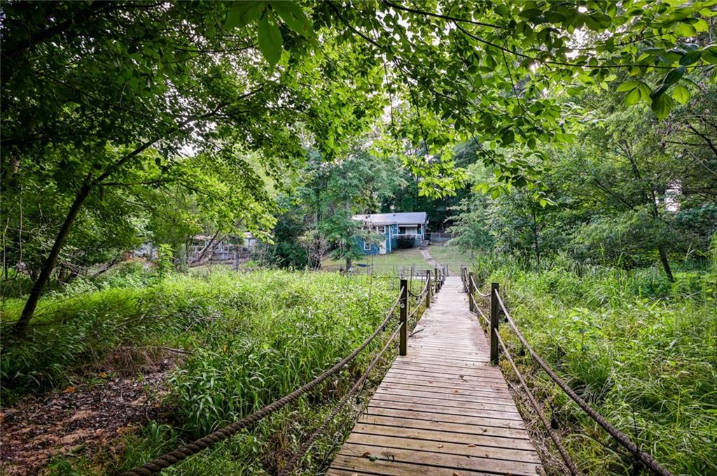458 Haley Road Jackson, GA 30233 - Photo 44 of 47 a view of a pathway with a wrought fence