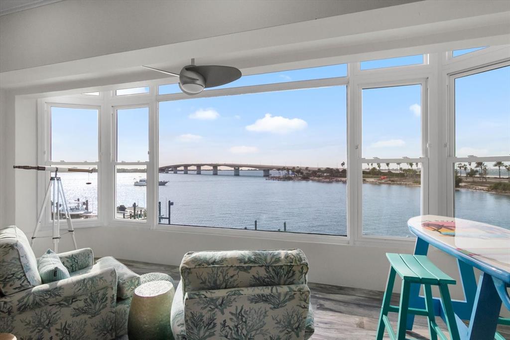 174 Golden Gate Point, Unit 32 Sarasota, FL 34236 - Photo 15 of 46 a living room with furniture and a large window