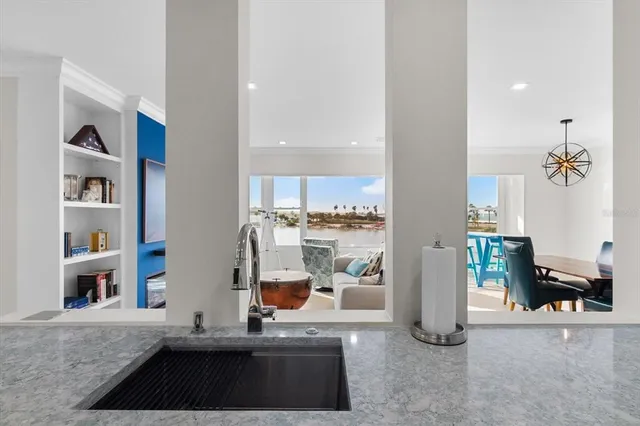 a view of an entryway with livingroom