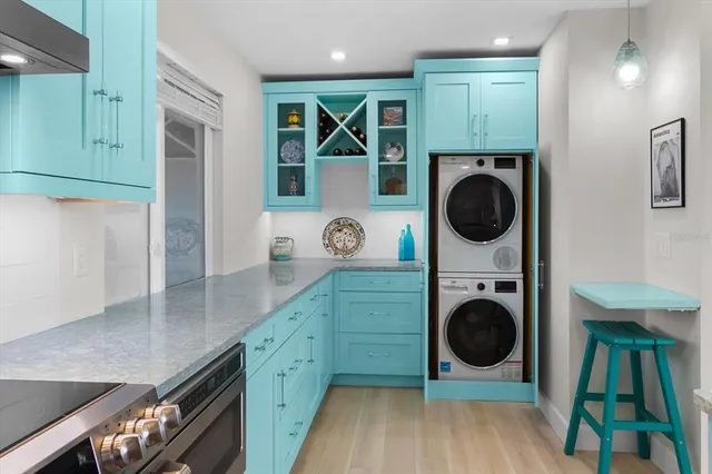 a view of kitchen with washer and dryer