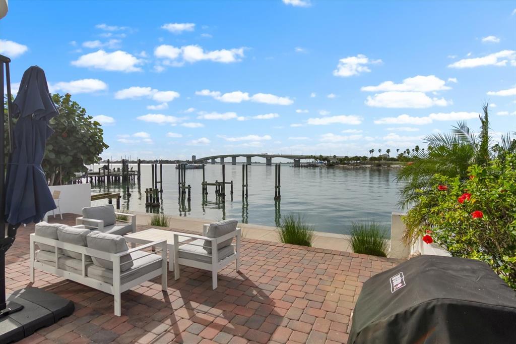 174 Golden Gate Point, Unit 32 Sarasota, FL 34236 - Photo 40 of 46 a view of a chairs and table on the terrace