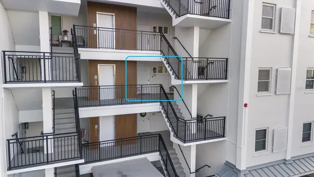 a view of entryway with a front door