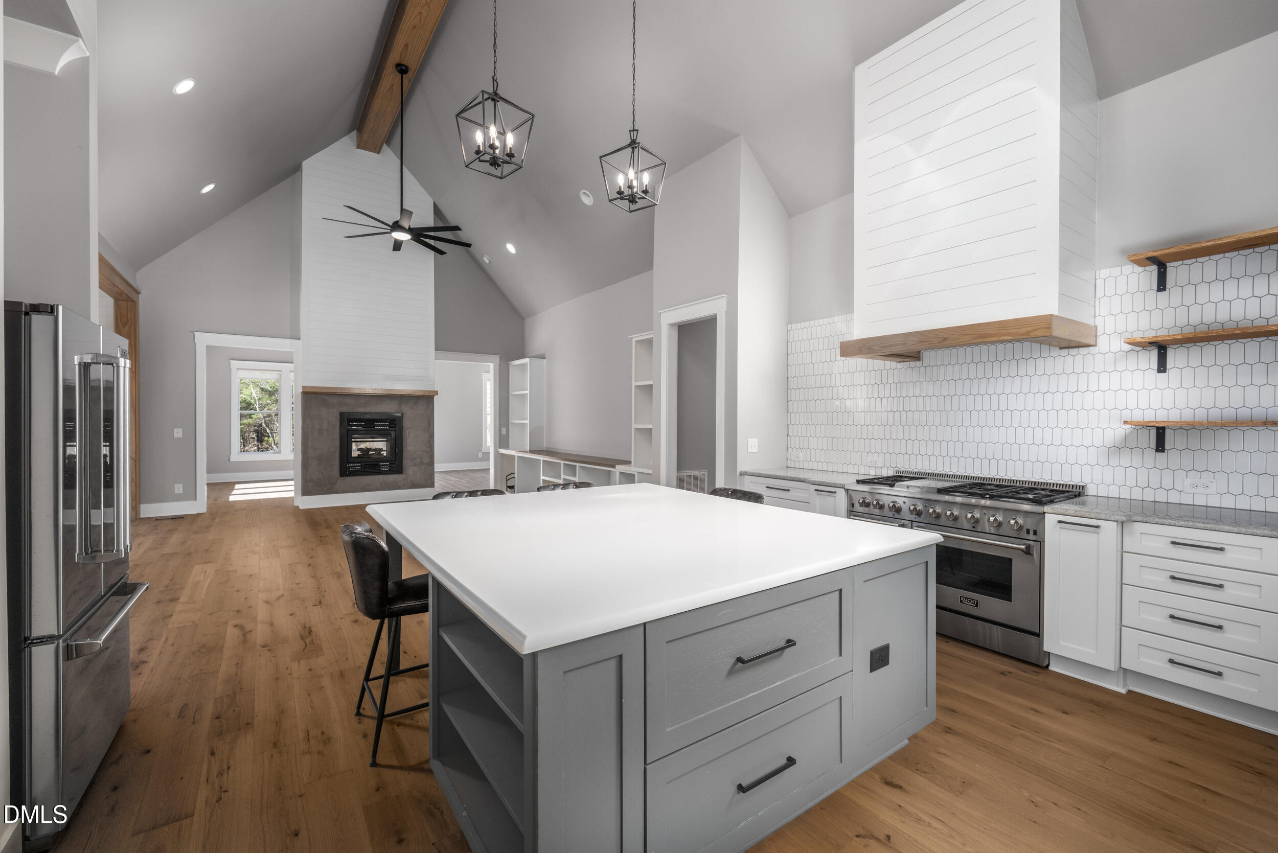 343 Deer Mountain Road Pittsboro, NC 27312 - Photo 11 of 55 a kitchen with a stove a sink and a refrigerator