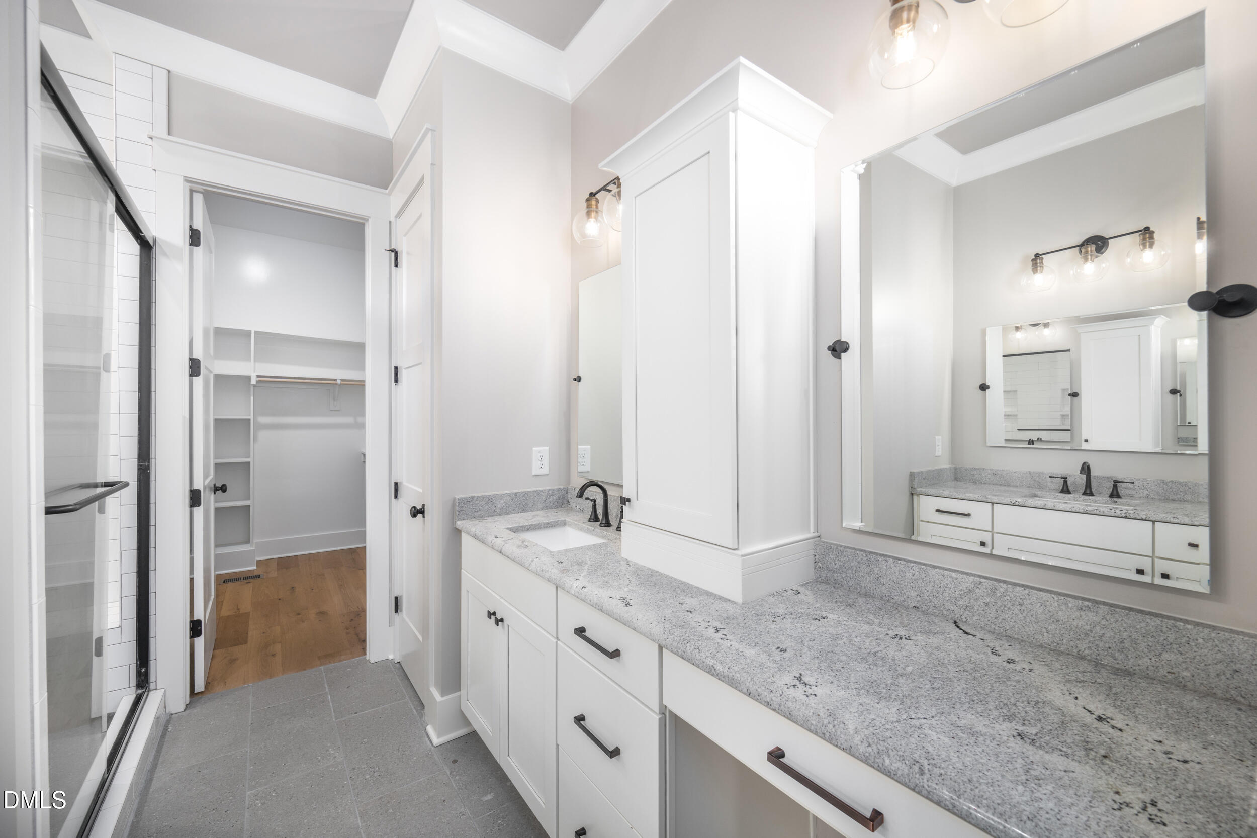 343 Deer Mountain Road Pittsboro, NC 27312 - Photo 25 of 55 a spacious bathroom with a granite countertop sink mirror and shower