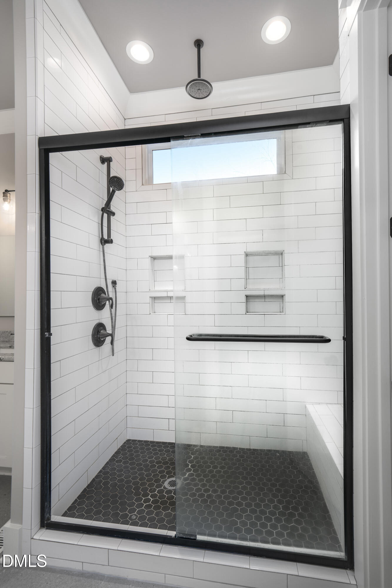 343 Deer Mountain Road Pittsboro, NC 27312 - Photo 26 of 55 a bathroom with a glass shower door