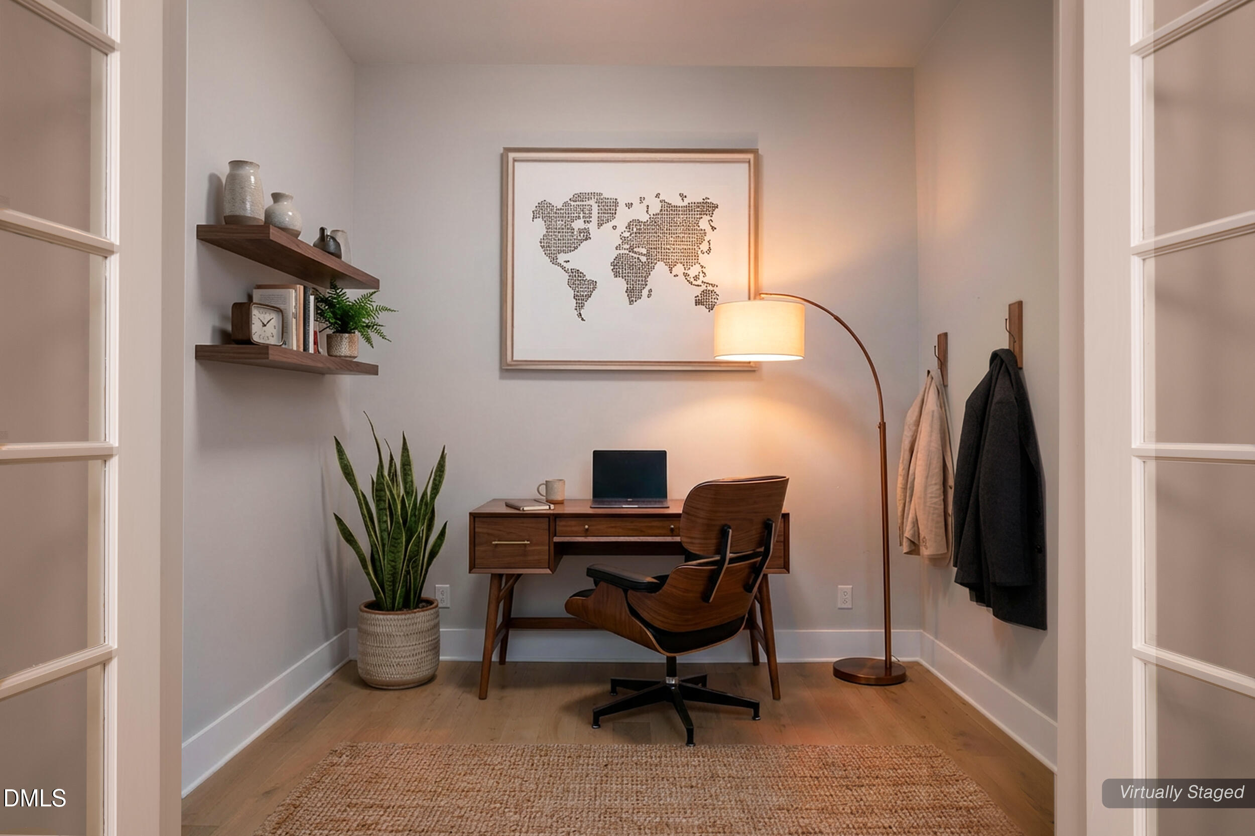 343 Deer Mountain Road Pittsboro, NC 27312 - Photo 34 of 55 a view of a workspace with furniture and a potted plant