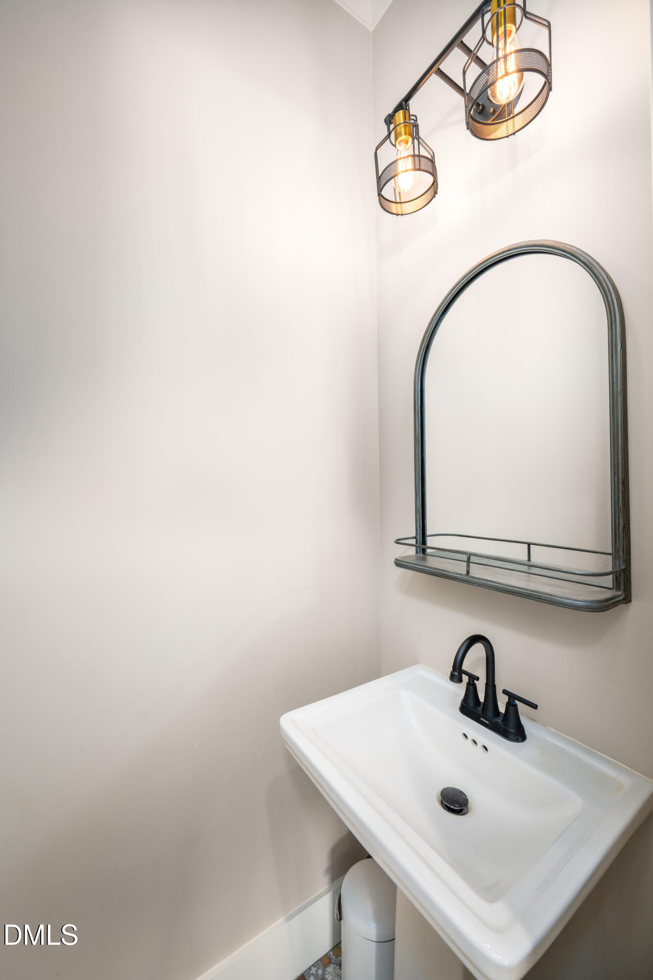 343 Deer Mountain Road Pittsboro, NC 27312 - Photo 39 of 55 a bathroom with a sink and a mirror